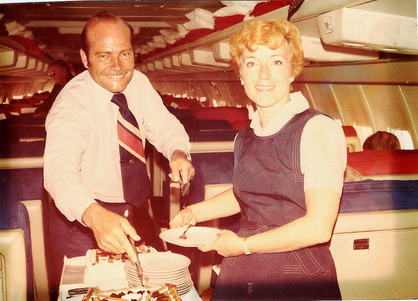 1970s Ray  & Andree LeDour working the dessert cart on a Pan Am Boeing 707 all first class charter for Olsen Tours.